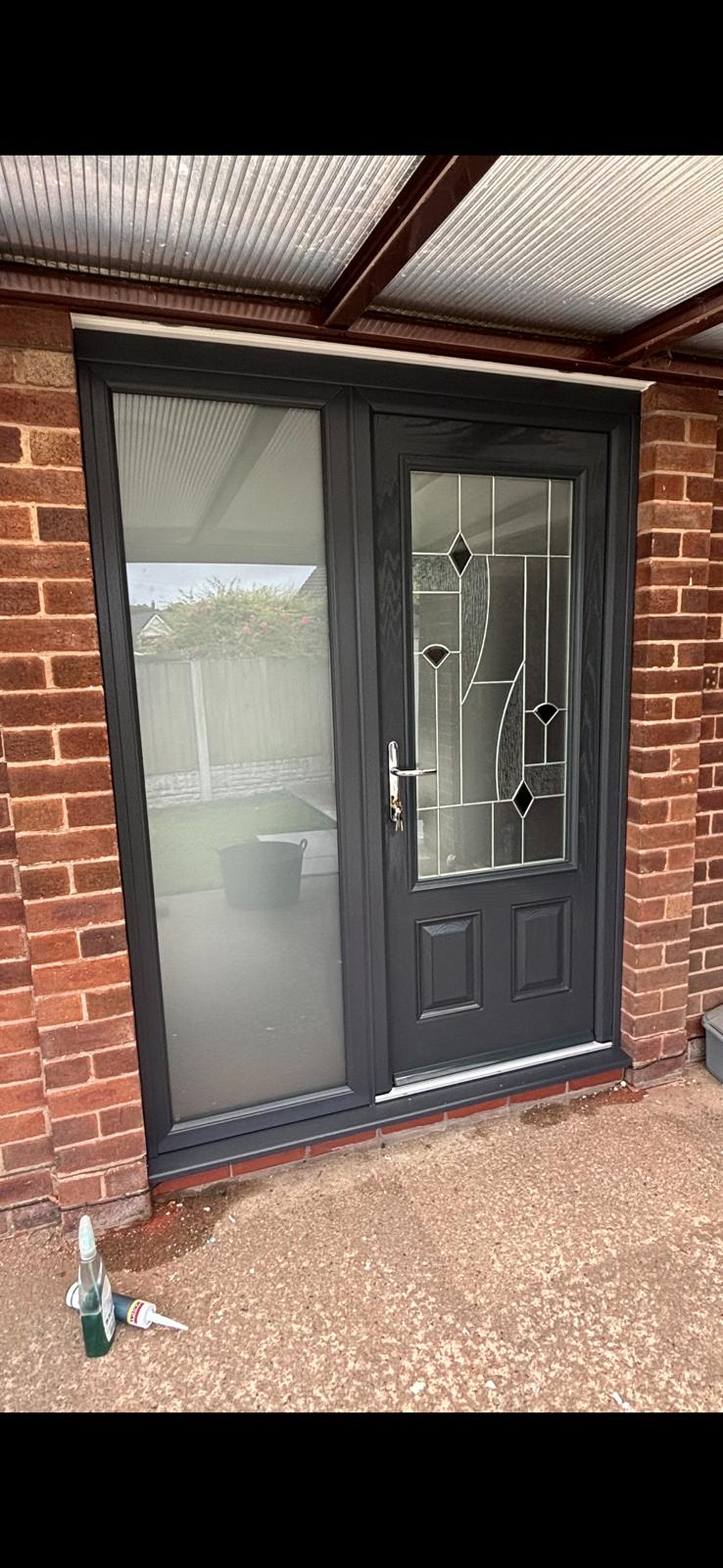 Black composite door gutter and fascia replacement